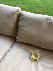white wine, summer evening, outdoor patio, sofa, beige, tan, backyard living, 