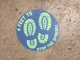 6 feet distance sign for covid-19 in the park