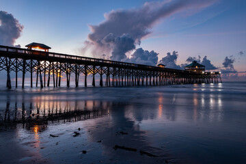 pier on glassy water