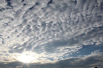 clouds with sun and rays