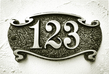 bronze house number plate