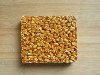 Brown color Peanut Chikki Indian snack