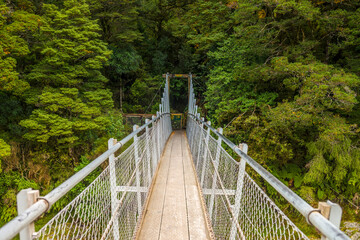 Suspension bridge at Blue Pools Track in South Island New Zealand