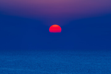 Colorful sun rise at sea