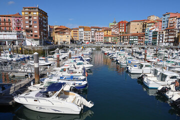 Fototapeta na wymiar The beautiful sunlit port of Bermeo in the Basque Country, Spain