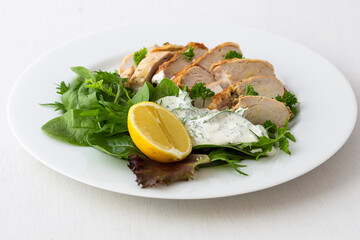 Greek Style Chicken with Salad and Tzatziki Sauce