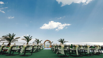 Fototapeta premium Beautiful Wedding ceremony event arranging at beach against sky
