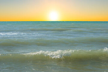 emerald summer sea coast at the sunset
