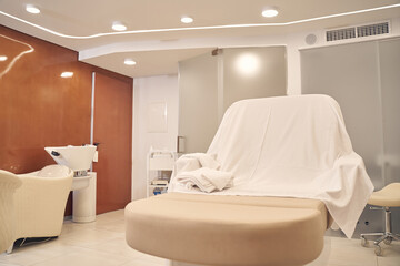 Modern spa salon designed in beige color
