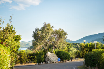 Mediterranean Landscape with Empty Road. Sunset on Sardinia. Italy.
