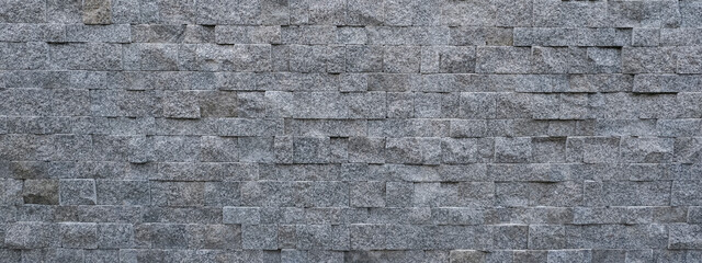Part of a stone wall, for background or texture. Copy space banner. Texture background