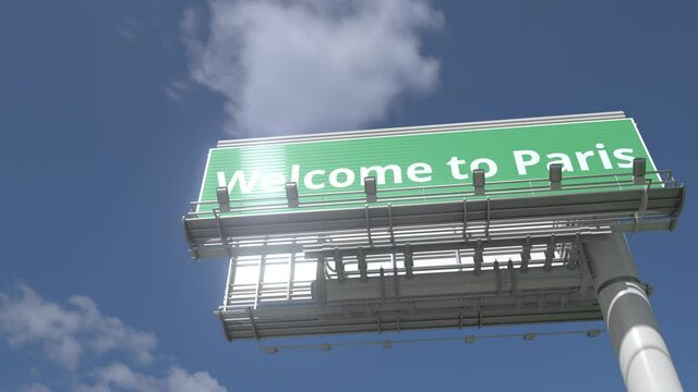 Airplane flies over WELCOME TO PARIS highway sign