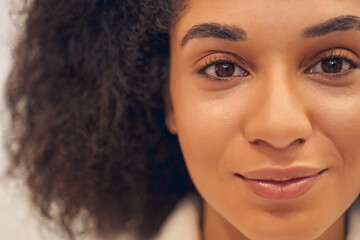 Admirable young Afro American woman feeling calm
