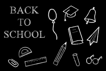 Outline drawings in white chalk on a black background. School set of design items. Back to school