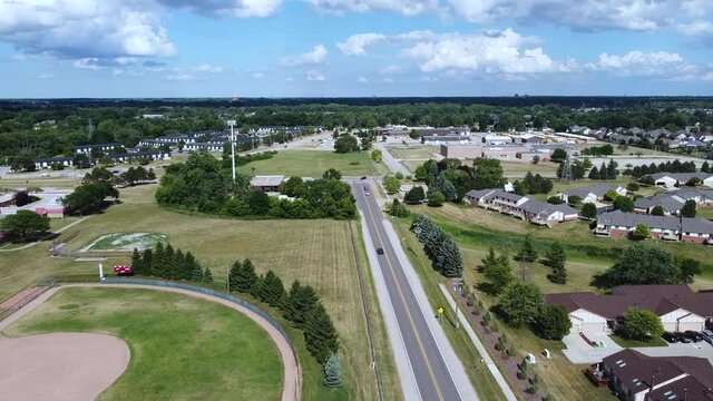Drone overlooks a lush suburban neighborhood in the east side of Michigan.