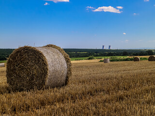 Blue and Cloudy Sky, Straw Bale in agriculture field Thrace Turkey Europe