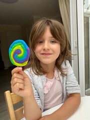 child with lollipop