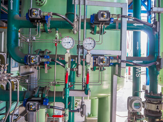 Pressure gauge of measuring instrument close up in industry zone at power plant.