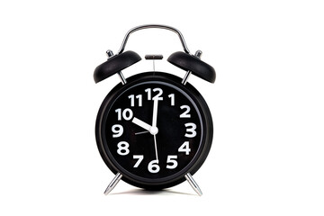 Black color vintage alarm clock, isolated on white background..