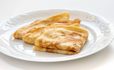 fresh Pancakes isolated on a white Plate