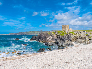 Aerial view of the beautiful coast next to Carrickabraghy Castle - Isle of Doagh, Inishowen, County Donegal - Ireland