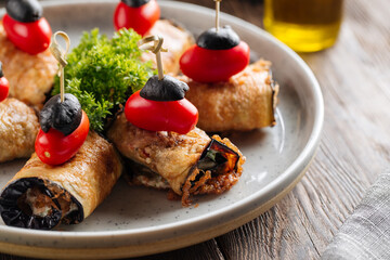 Closeup on eggplant rolls appetizer