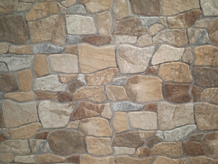 robust coating for walls and floors with stones of different sizes and colors