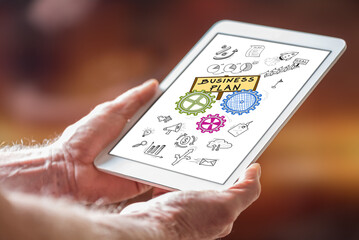 Business plan concept on a tablet