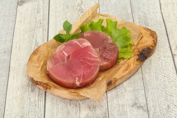 Raw tuna round steak for grill
