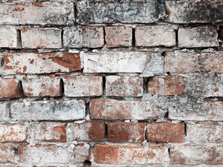 Brick wall, weathered, worn wall damaged paint. Grunge Concrete Surface. Great background or texture.