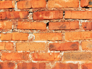 Brick wall, weathered, worn wall damaged paint. Grunge Concrete Surface. Great background or texture.