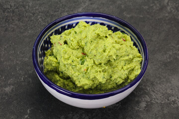Avocado guacamole sauce with chili pepper