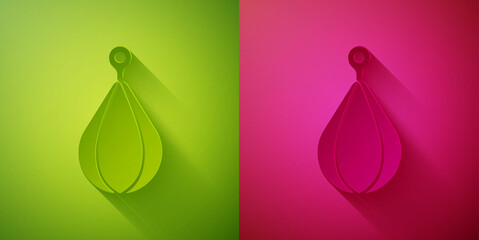 Paper cut Punching bag icon isolated on green and pink background. Paper art style. Vector.