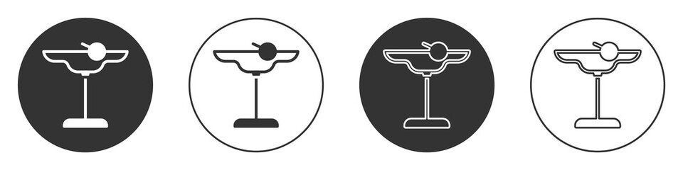 Black Margarita cocktail glass with lime icon isolated on white background. Circle button. Vector.