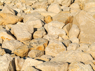 Large stones on the stone beach in the background
