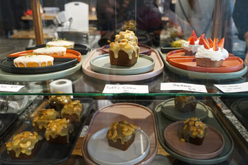 Close up Toffee cake with roasted cashew nuts and caramel