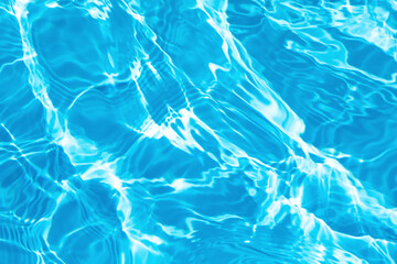 Closeup of rough water surface texture with splashes and bubbles in mint blue color. Trendy fresh abstract nature background. 