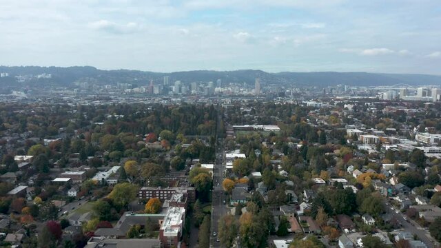 Residential Neighborhood Of Portland Oregon With Downtown In The Distance