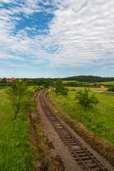 Fototapeta na wymiar Curving railway track near Valaske Prikazy village in Czech republic