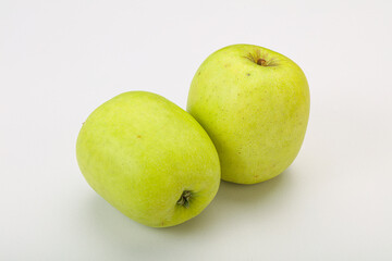 Two ripe green sweet apples