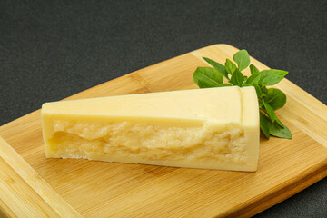 Hard parmesan cheese served basil