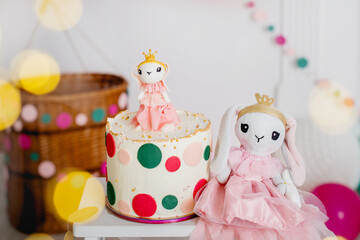 soft toy bunny near the cake. Birthday