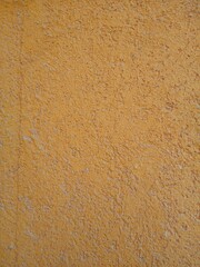 Naklejka premium Background from an orange wall of sandstone close-up.