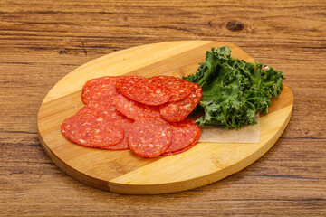 Italian spycy pepperoni sausage slices