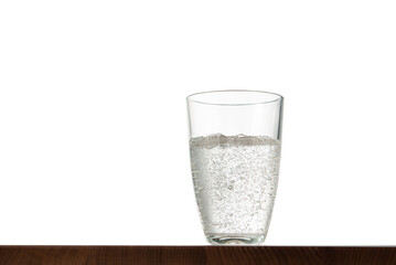 Glass of water on table with isolated background
