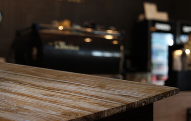 Wood Table Top in Blur Background room interior with empty copy space.