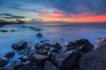 sunrise on the rocky beach