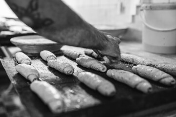 B&auml;cker beim Backwerk rollen