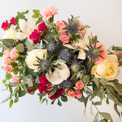 Woman holding beautiful flower bouquet