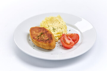 cutlet with mashed potato on white plate